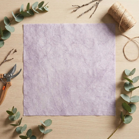 Boss Florist Pop Up Tissue Sheets For Flowers 266 Waterproof Bouquet Paper Easy Peel Dispensing on table with twine and plants