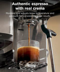 Home Barista Luxe Café Mini Espresso Machine with espresso pouring into a glass cup, showing crema and steam wand