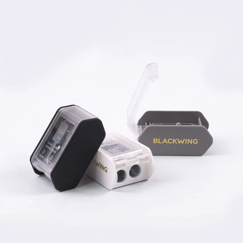 Two Step Long Point Pencil Sharpener With German Steel Blades In White Matte Finish, compact design, visible sharpening openings.