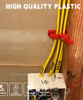 Mingzhe Multi Cable Clips 25 Pack, red clip securing multiple yellow electrical wires on a wall, made from high quality plastic.