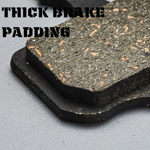 Close-up of Four Pairs Disc Brake Pads Kit For Avid Elixir And SRAM Brakes With Rotor Alignment Tool, showing thick pad texture.