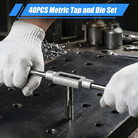 Close-up of a metal tap-and-die stock held by gloved hands over a metal workbench, part of a 40-piece metric tapping set.