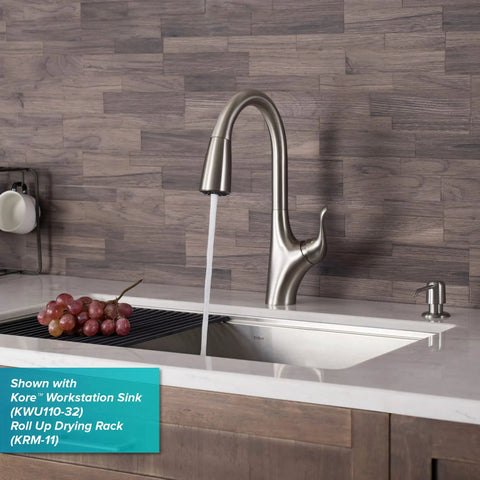 Merlin Dual Function Pull-Down Kitchen Faucet With Single Handle, 16-Inch Reach, stainless steel finish, mounted on sink.