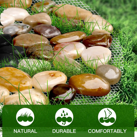 Close-up of Six Piece River Rock Stepping Stone Mat Set with polished pebbles and grass, showcasing durability and comfort for decor.