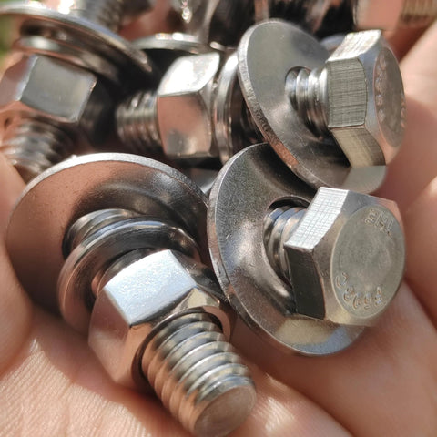Assorted stainless steel hex bolts with flat and lock washers, nuts (3/8-16 x 1-1/4), 8 sets