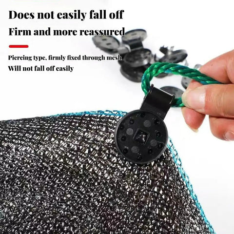 Close-up of Beefy Lock Grip Tarp Clips attached to a mesh canopy, showing durable plastic construction and firm grip.