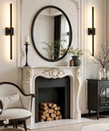 Cordless Black Rechargeable Wall Sconce With Remote 8000Mah Battery Operated near a stylish fireplace and mirror decor.