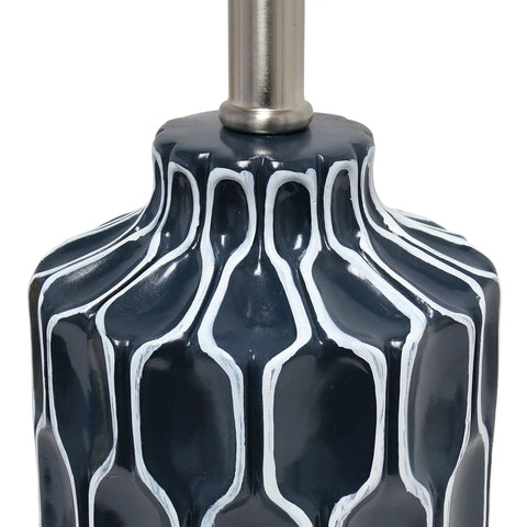 Close-up of blue ceramic table lamp with handpainted white pattern, 12 inch diameter, part of Contemporary Home Decor Lighting.
