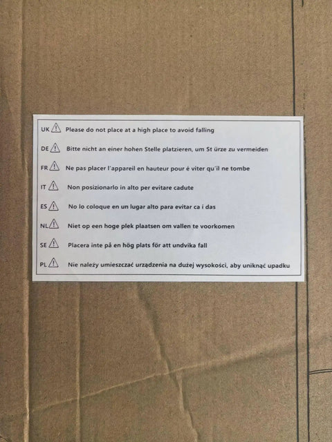 Warning label in multiple languages advising against placing the robotic lawn mower at a high place.