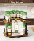 Two Tier In Cabinet Spice Rack Organizer with Rotating Lazy Susan in kitchen, holding spice jars, ideal for 11 inch cabinets.