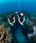 Two divers underwater using MK11 S270 Regulator Set for Scuba Diving, Balanced Diaphragm First Stage Delivers Consistent Airflow