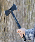 Person holding Stealth Dual Bit Axe For Outdoors Beefy Built Hand Axe With Steel Handle And Shock Block Grip Ideal For Camp Tasks