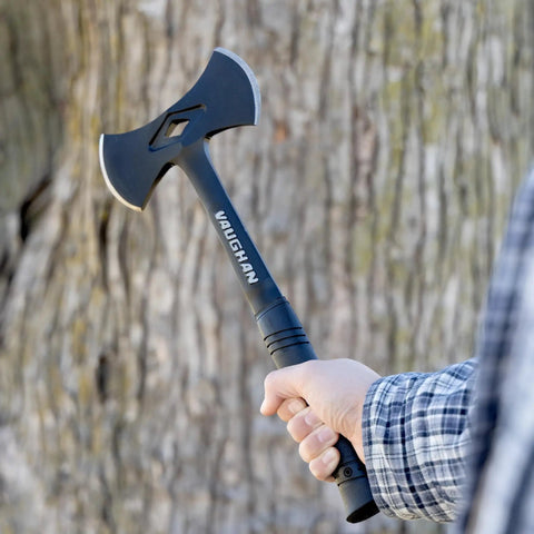 Person holding Stealth Dual Bit Axe For Outdoors Beefy Built Hand Axe With Steel Handle And Shock Block Grip Ideal For Camp Tasks