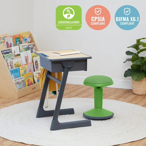 Sitwell Wobble Stool With Cushion Adjustable Height Active Seating For Movement Perfect For Class Or Home Grassy Green next to desk