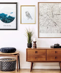 X Large Heavy Duty Picture Hanging Strips Damage Free Adhesive Wall Mounts holding framed art on a modern wall.