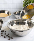 Stainless Steel Meal Prep Mixing Bowls Set for Real Kitchen Pros, 5 Pieces shown with flour and eggs being mixed in