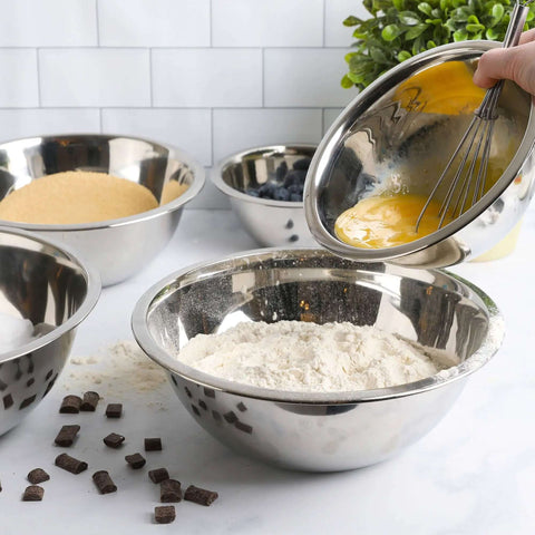 Stainless Steel Meal Prep Mixing Bowls Set for Real Kitchen Pros, 5 Pieces shown with flour and eggs being mixed in