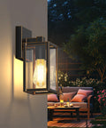 Dusk To Dawn Outdoor Porch Light With Built In Two GFCI Outlets illuminating a cozy patio scene at night