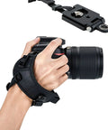Hand holding a camera with Pro Mirrorless Camera Hand Grip Strap With Arca Type Plate, adjustable and no-slip design visible.