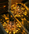 Butterfly Solar Powered Outdoor Metal Lanterns Set Of 2 Waterproof Hanging Patio Lights For Garden Decor casting shadows