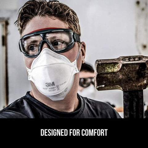Worker wearing Particulate N95 Respirator 9205 Flat Fold Lightweight Non Valved 20 Count Pack NIOSH Approved in workshop