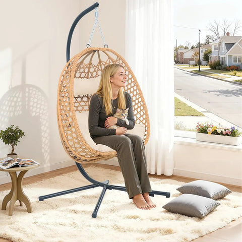 Cozy Hanging Egg Chair With Stand And Plush Cushions for indoor use, featuring a natural wood finish and modern boho style.