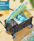 Beach Wagon With Balloon Wheels For Sand, 240L Collapsible Wagon filled with beach gear, black 600D Oxford fabric, on sandy beach