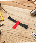 Durable Side Mount Scuba Tank Strap Holder Built From Tough Rubber, Easy Clip On Oxygen Cylinder Carrier amid tools on a wooden table