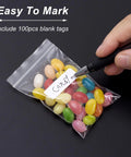 300 Clear Mini Plastic Baggies Two Point Two By Three Inch Reclosable Bags For Beads Jewelry Pills Screws Crafts And Packaging Food Grade Safe Easy Seal Resealable Poly Bags With Blank Sticker Tags shown with candy