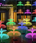 Solar Star Jellyfish Garden Lights Six Pack With Color Changing Fiber Optic Glow for outdoor yard and garden decor at night.