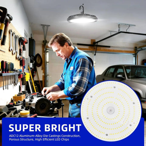 Man working in garage under Two Pack 150W LED High Bay Light 5000K UFO Fixture with US Plug, illuminating work area.