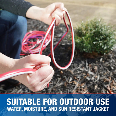 Person holding Beefy Built Tough Outdoor Extension Cord 50 Ft 12 Gauge 3 Conductor With Lighted End SJTW in red, white, blue