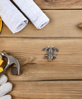 Toad Shaped Brass Cabinet Drawer Pulls For Vintage Style Retro Hardware For Kitchen, surrounded by tools on wood surface