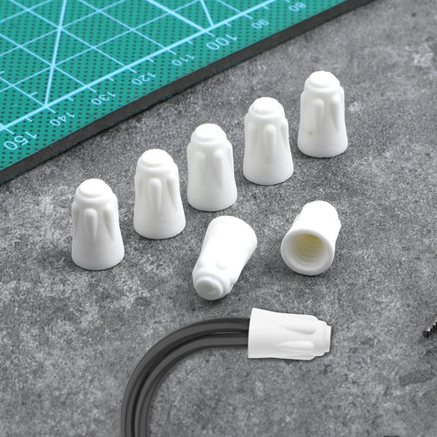 Ceramic wire connector caps; white porcelain high-temperature caps for 22-14 AWG wires, front view