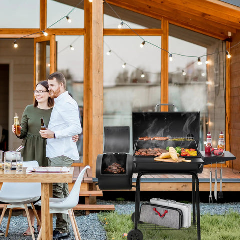 Couple enjoying backyard by CC1830SC Charcoal Offset Grill Smoker With Cover 823 Square Inches Total Cooking Space Black Outdoor Grill