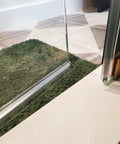 Shower Door Bottom Seal With Drip Rail For 1/4 Inch Glass, 36 Inch Long Sweep, Ultra Clear Polycarbonate on bathroom floor