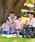 Family picnic with Picnic Backpack Cooler Bag With 30L Capacity Insulated Food And Drink Carrier in camouflage pattern.