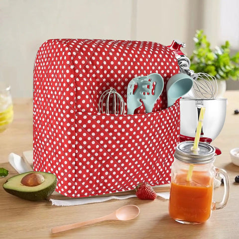 Durable Quilt Stand Mixer Cover For 6 To 8 Quart Tilt Head Bowls with utensil pockets on a kitchen counter.
