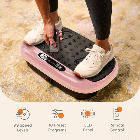 Person adjusting remote on HexaPlate Lite Vibration Plate For Full Body Toning And Recovery With Lymphatic Drainage Compact Vibe Platform