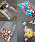 Clear Cake Pop Bags 3x5 Inches, 300 Pcs With Twist Ties, showcasing cake pops, star candies, popcorn, and a cookie, 1.4 mil OPP plastic bag