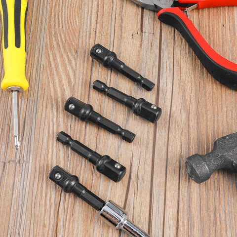 Impact Driver Socket Adapters Set Five Pieces In Durable Black Finish on wooden surface with tools around