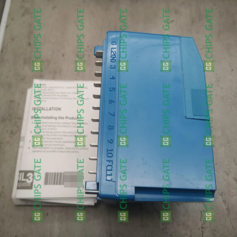 RM7800L1012 Heavy Duty Industrial Control Module in an enclosed blue box for PLC systems on a concrete surface