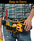 Person with tool belt holding Telescoping Magnetic Pickup Tool 40 Inch Extendable Magnet Stick With 35 Lb Pull for metal objects