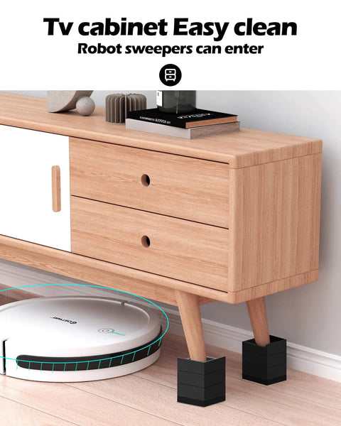 Give Your Bed Or Sofa A Legit Boost With These Heavy Duty Furniture Risers Featuring Adjustable Heights Anti Slip Grip Shock Absorbing Base And Rock Solid Support Handling Up To 1300 Lb Load In Sleek Black under a TV cabinet.