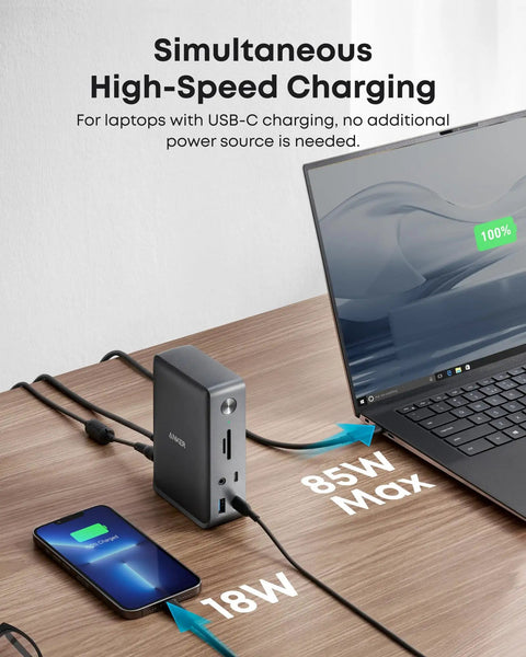 Beast 13-In-1 USB-C Docking Station With Triple Display 85W laptop charging and connected devices on wooden desk
