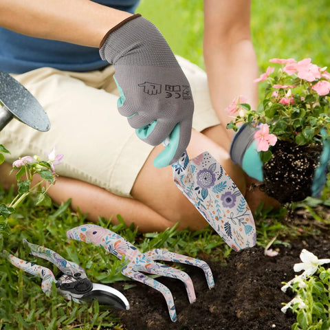 Gardener using Aluminum Garden Tool Set Four Piece With Trowel Rake Pruner And Gloves In Sturdy Box Heavy Duty Floral Pattern