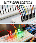 Two breadboards with 40 colorful female to female jumper wires kit with 100 cm flat ribbon cables DuPont wires for Arduino projects.