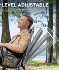 Man reclining in a Lightweight Folding Recliner Chair For Adults With 4 Position Adjustable Back Portable Lawn Chair outdoors
