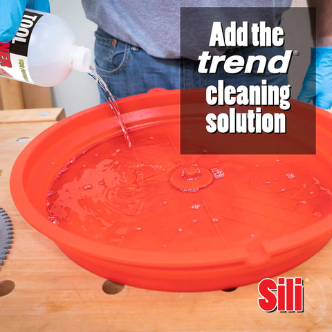 Adding Trend cleaner to silicone tray of Deluxe Saw Blade Cleaning Kit With Silicone Tray And 18oz Spray Cleaner Includes Trend Tool.