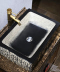Kickstart Your Top Shelf Bathroom Refresh With This Retro Ceramic Vessel Sink Featuring Imitation Stone Finish And Including Faucet For Single Basin Above Counter Lavatory Vanity Setup, 58x40x15cm black and cream vessel sink with modern faucet.